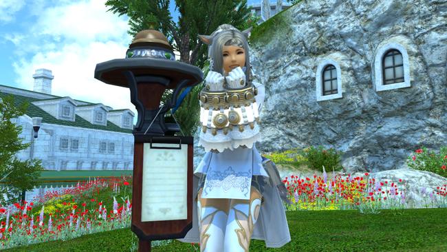 A Summoning Bell outside of a Free company house in FFXIV.